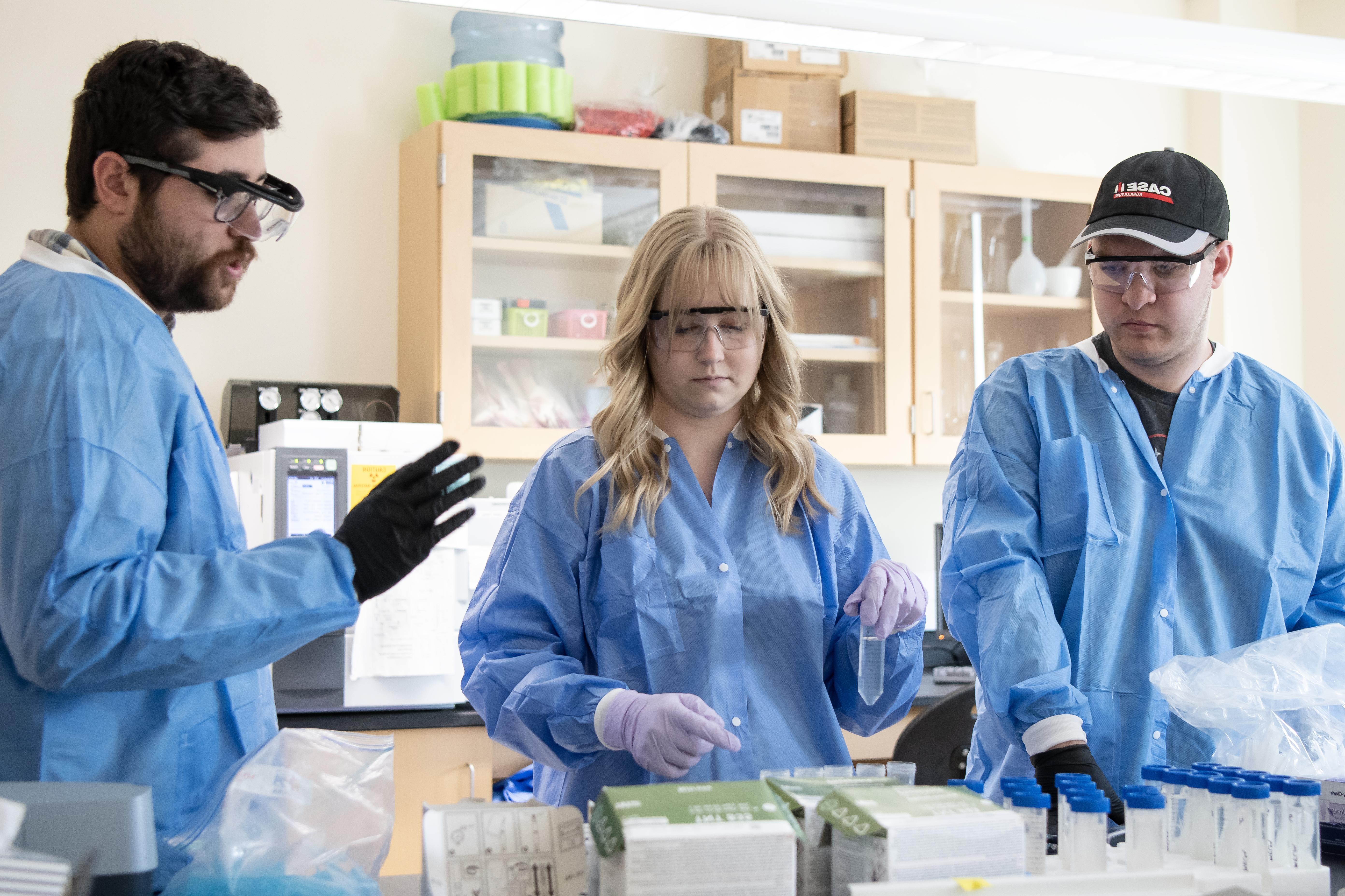 students in lab gear